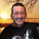Caron, Normand
